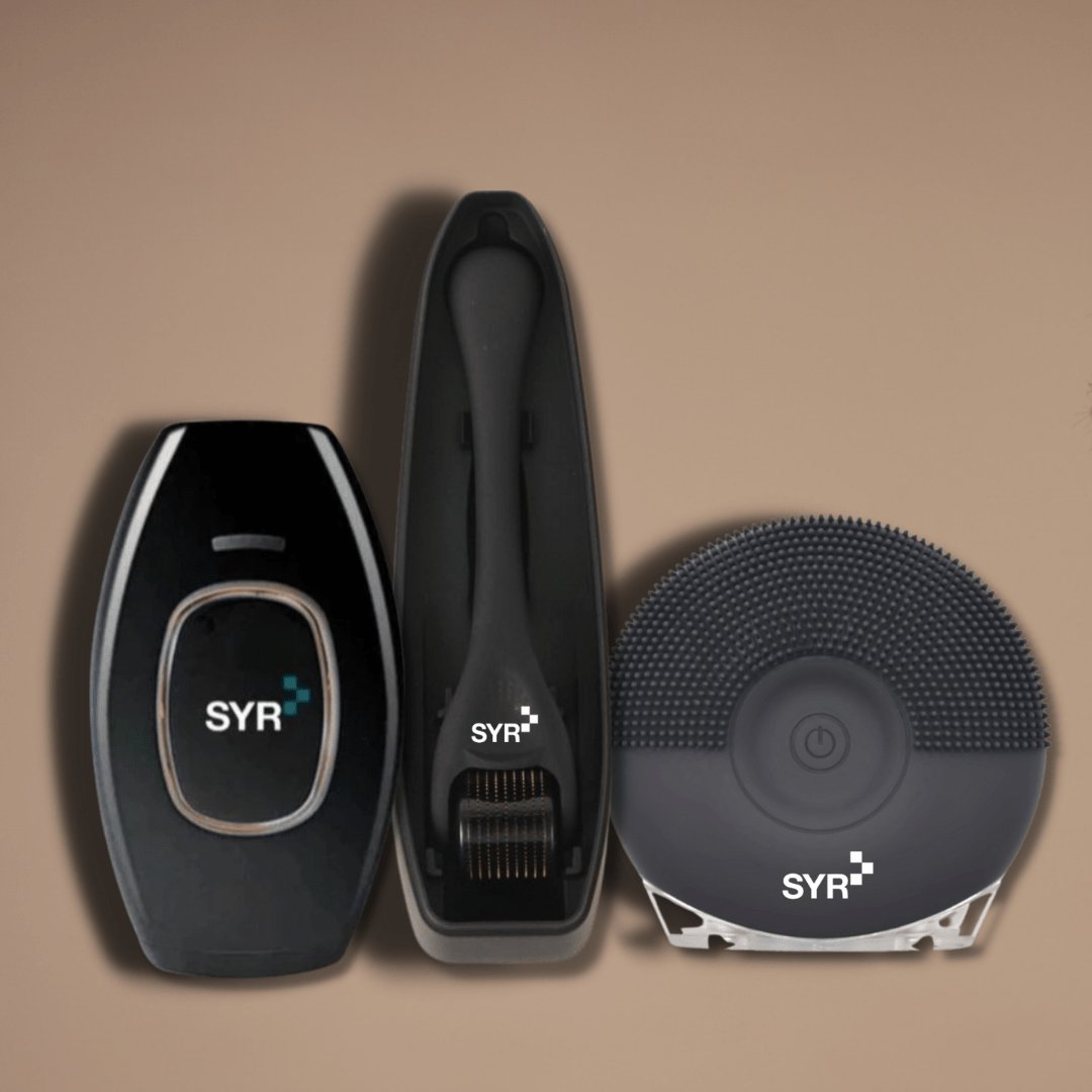 Men's grooming tools, the At Home Laser Barber, Skyn + Beard Roller, and Sonic Skyn Scrubber